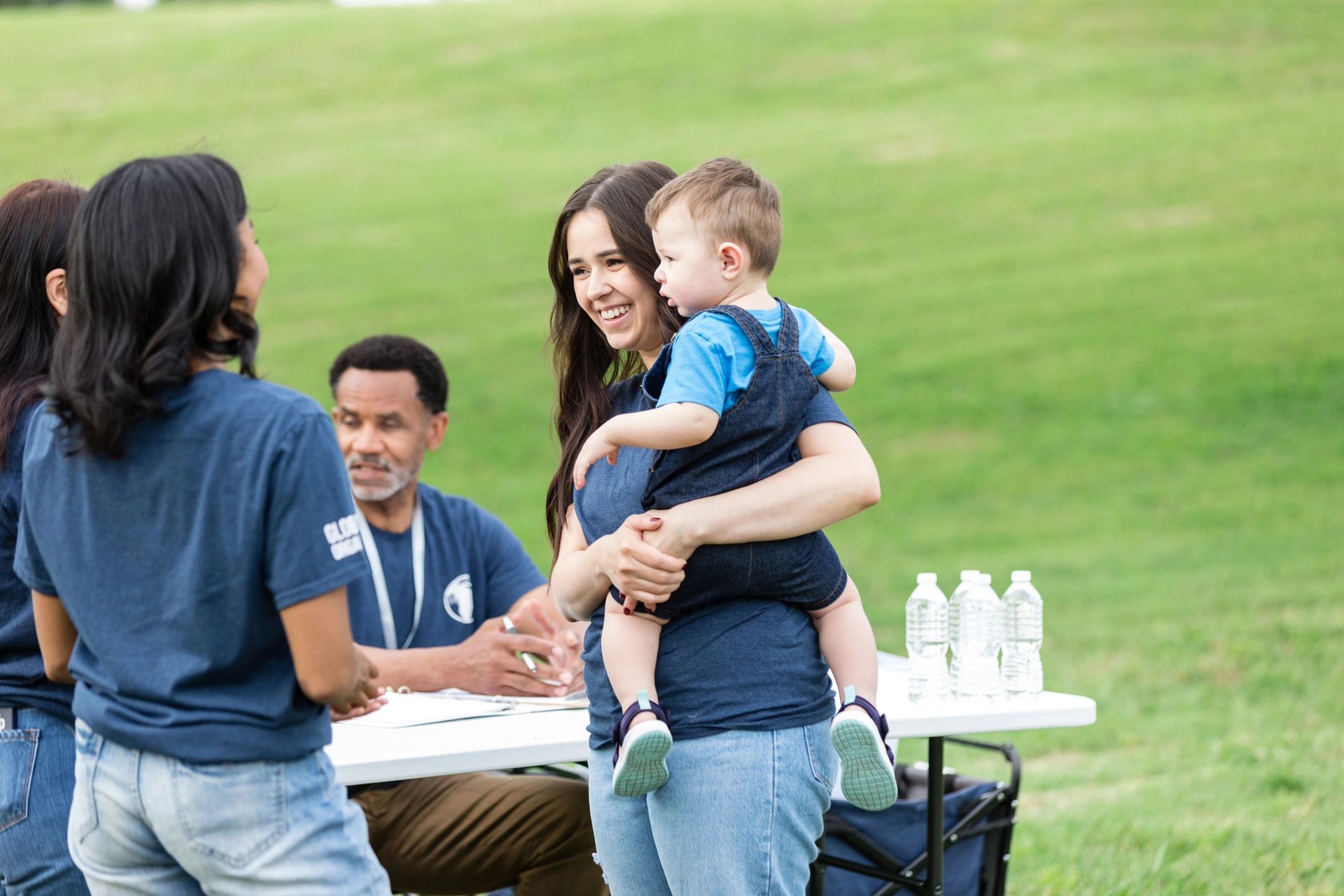 Parent and child at a registration table