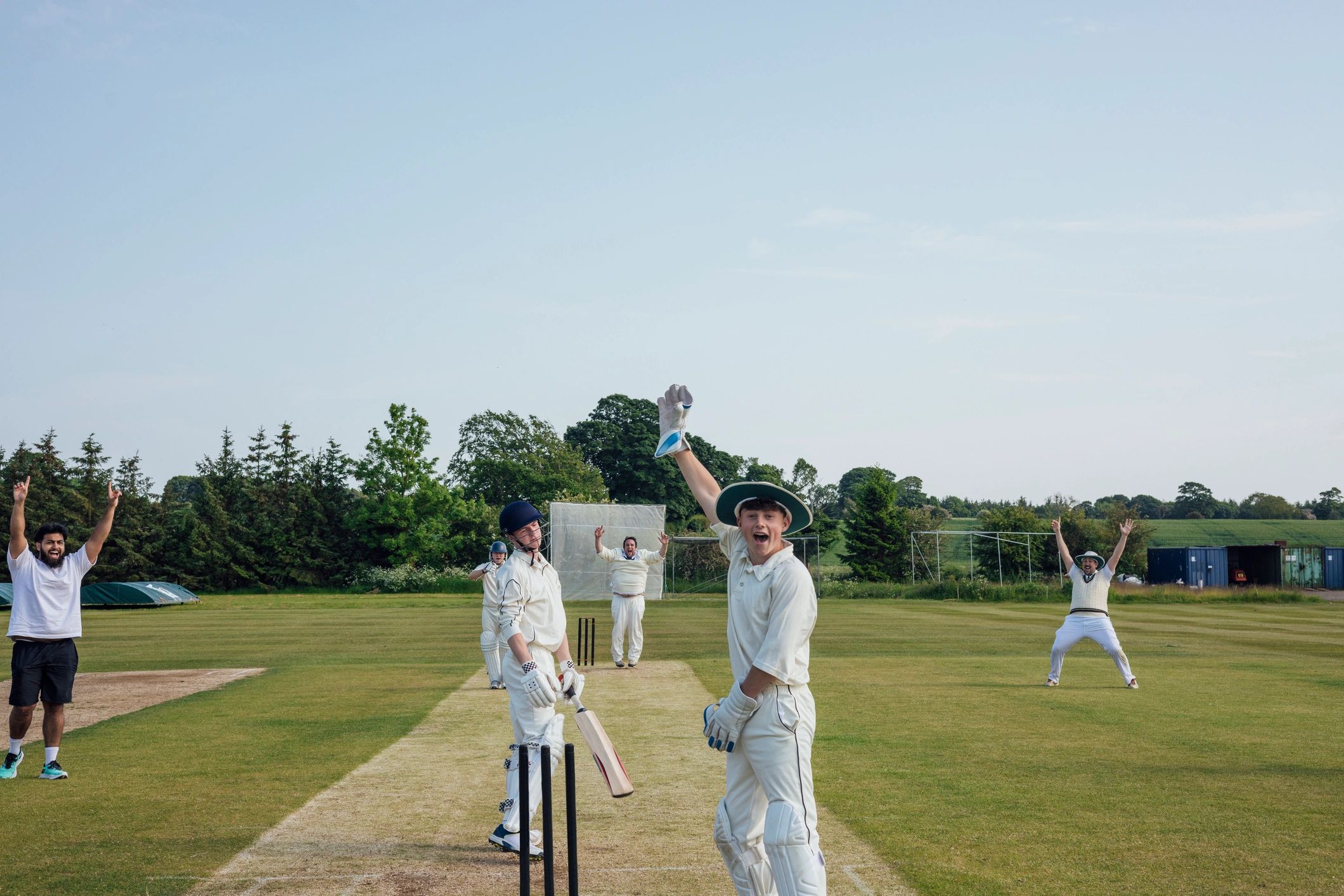 Cricket team celebrating after a win