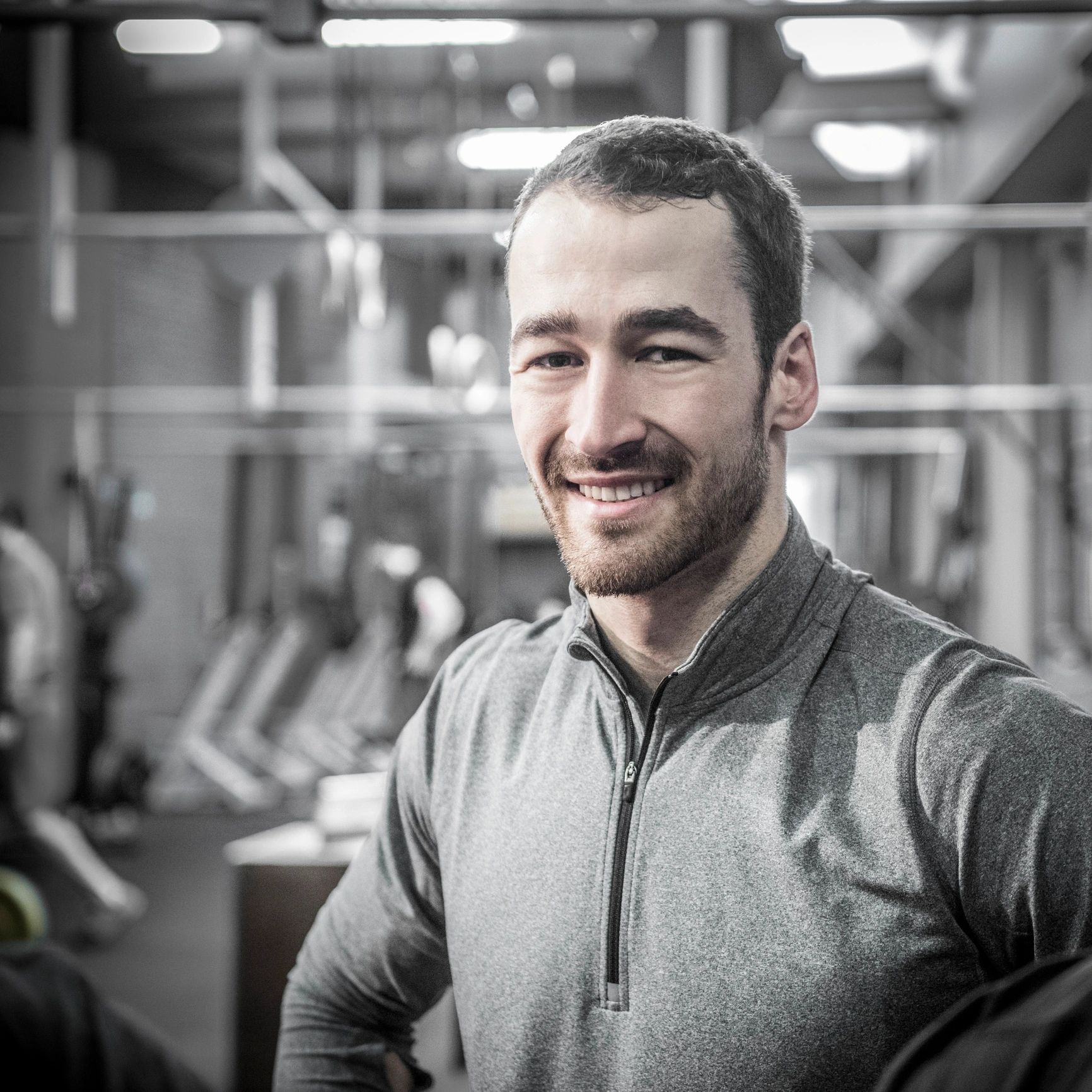 Portrait of a coach smiling towards camera